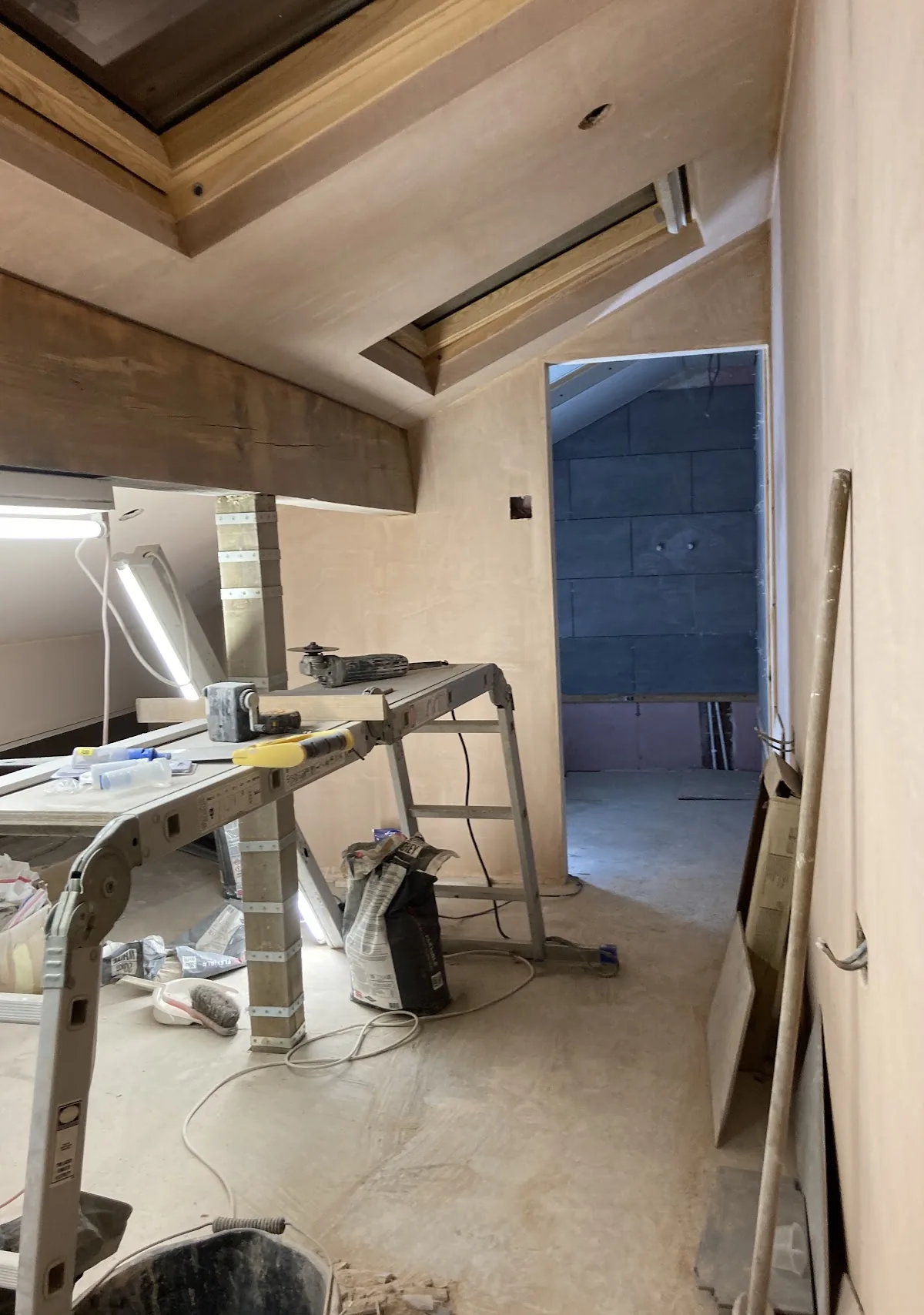 Extension part-way through the job, walls boarded out and a work platform set up for skimming